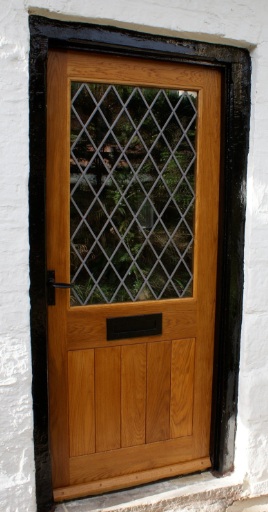 glazed framed ledged door