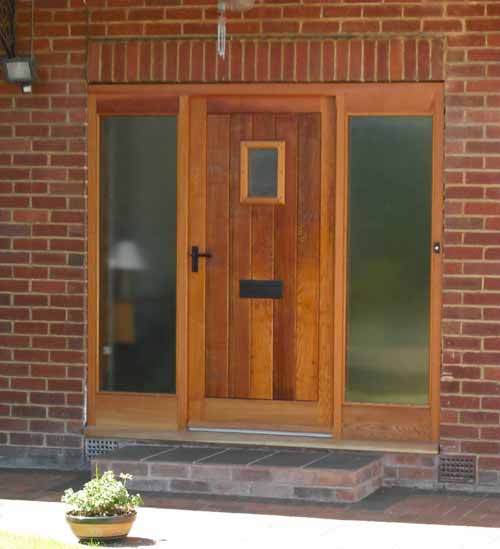 cedar door with sidelights