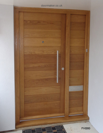 contemporary oak door with timber side panel