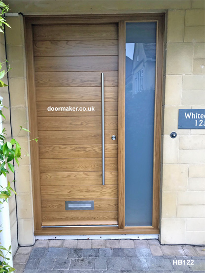 oak contemporary door and frame with sidelight
