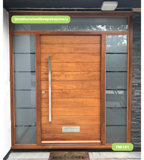contemporary iroko door with sidelights and toplight