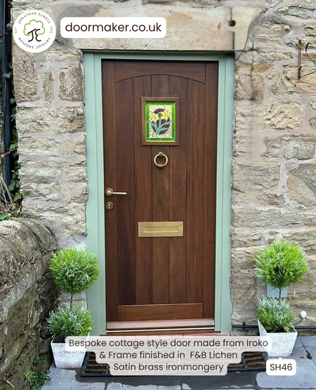 iroko cottage door with lichen frame and satin brass ironmongery