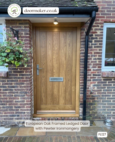 european oak cottage door with pewter letterbox and handle