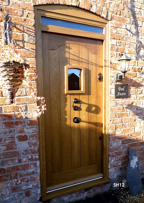 oak door with swept head and vision