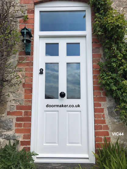 victorian style door and frame with toplight